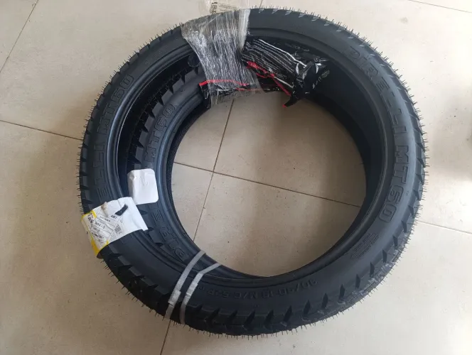 pneu pirelli 90 /90 aro 19 + 110/90 17 par de pneu original(+ par de camera)