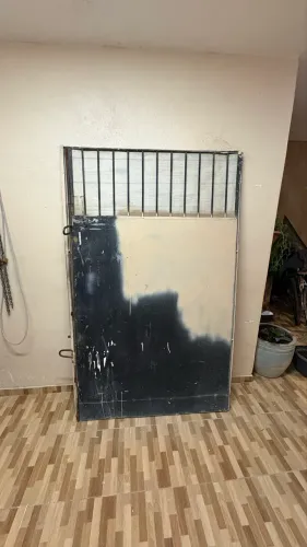 Portão de garagem de ferro