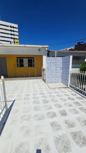 Casa de andar com ponto comercial Av. Brasil