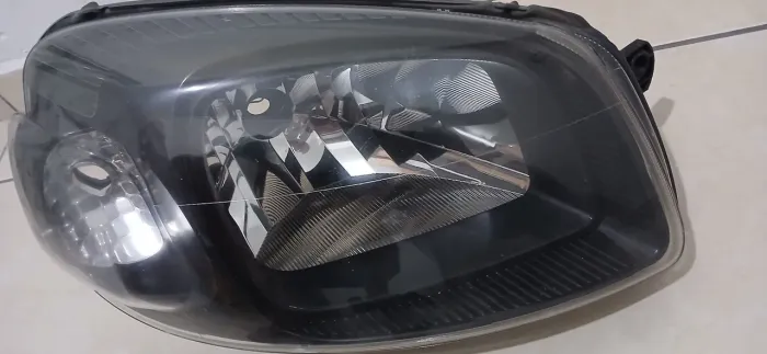 FAROL MÁSCARA NEGRA FIAT UNO (ORIGINAL)
