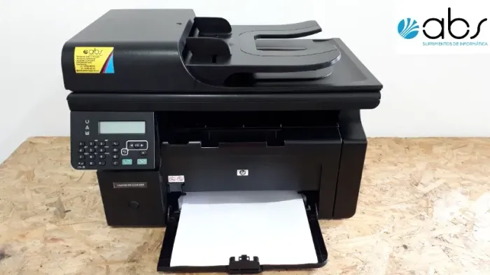 Impressora multifuncional a laser HP M1212nf completa com um toner novo e garantia