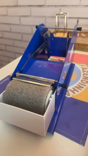 Máquina canoa de fita gomada