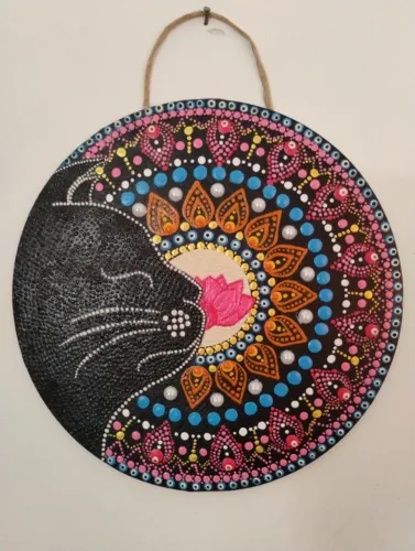 Decoração parede gato com olho grego