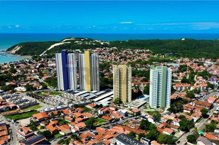 Apartamento com tres quartos vista mar e duas vagas de garagem
