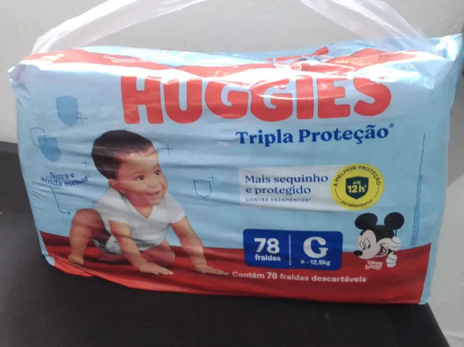 Lote de fraldas tamanho G - 11 pacotes de fraldas Huggies e outras