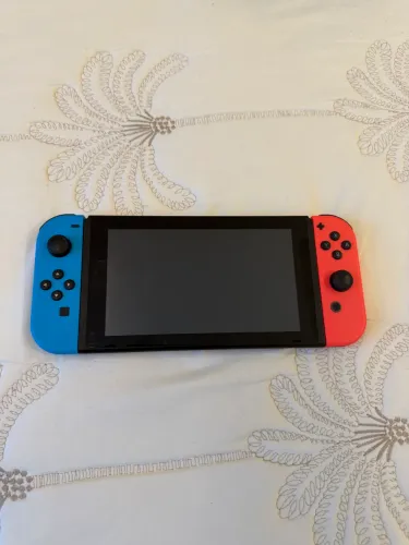 Nintendo switch 32gb + MacroSD 256gb