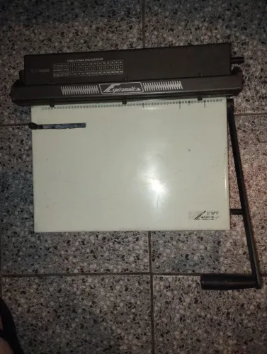 Encardenadora Lassave funcionando em perfeito estado, tem alguns arranhões