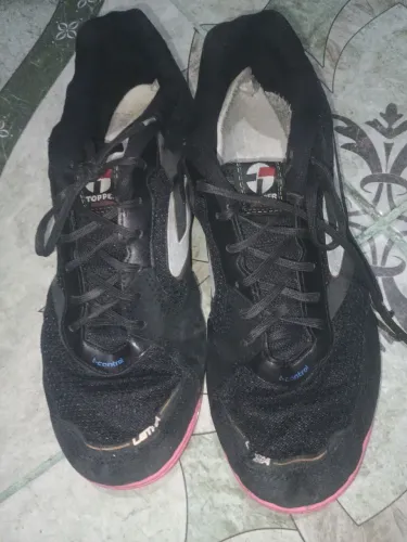 Chuteira Topper nike usando em bom estado 