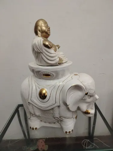 Elefante e Buda em porcelana década de 1980