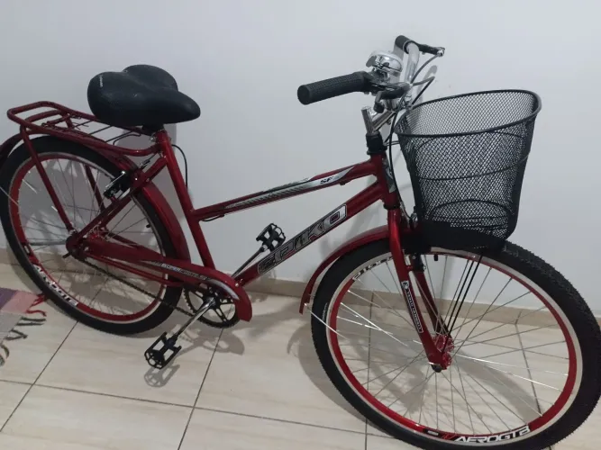 Vendo bicicleta feminina nova com cesta 