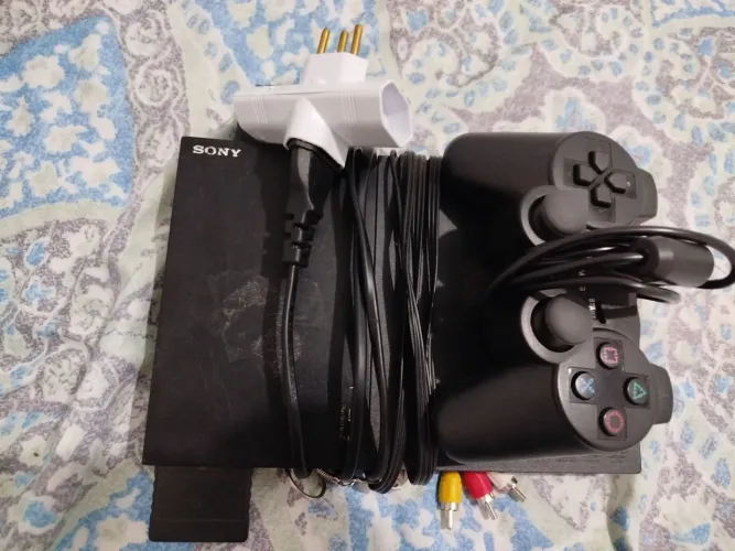 Playstation 2 com 1 pendrive 1 controle 1 memory card 1 e 4 jogos no pendrive 