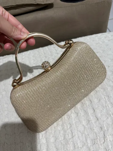 Bolsa de mão dourada
