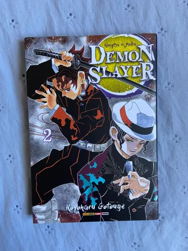 mangá volume 2 de Demon Slayer: Kimetsu no Yaiba