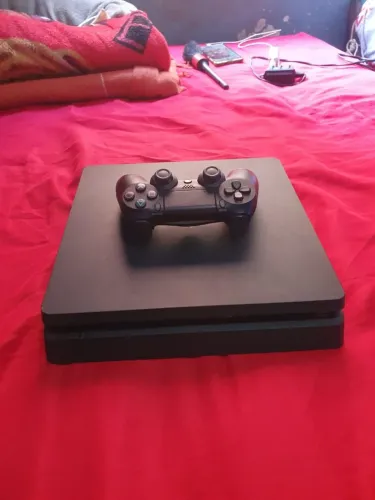 Ps4 com 1 Controle Original e 27 jogos mídia física 