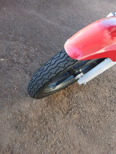 Cg 150 ex muito conservada e revisões em dia.