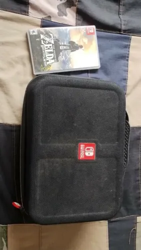 Jogo + bolsa de trasporte Nintendo Switch+ controle