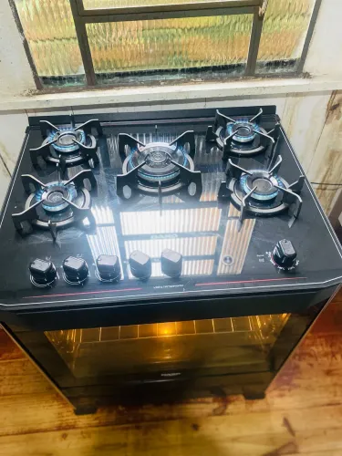 Vendo Fogão Dako 5 bocas mesa de vidro todo preto.