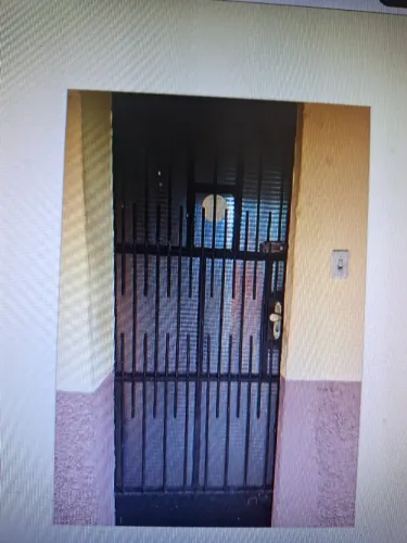 PORTA DE FERRO COM VIDRO