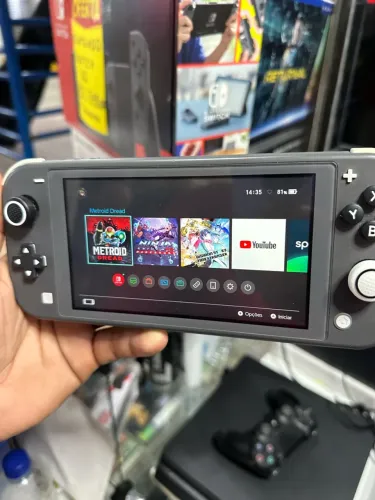 NINTENDO SWITCH LITE DESBLOQUEADO COM CARTÃO DE 64gb