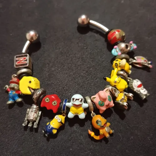 Bracelete de aço inoxidável e berloques de prata 925