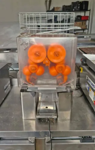 Máquina espremedora de suco laranja  