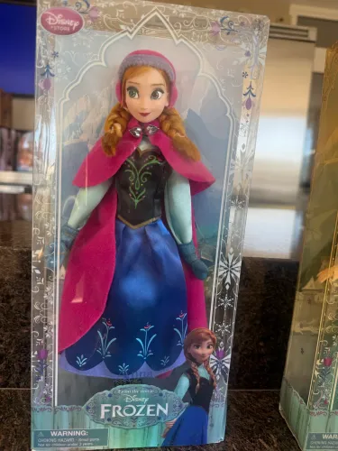 Boneca frozen disney anna na caixa