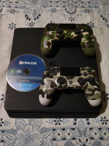 Vendo ps4 500 g dois controles um original acompanha jogos FIFA 23 Red Dead 2 FC 26 GTA 5