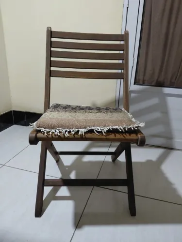 Cadeira dobrável com almofada