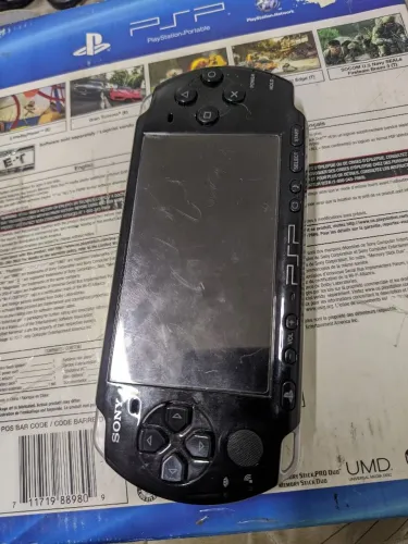 PSP 3001 com caixa e manual 