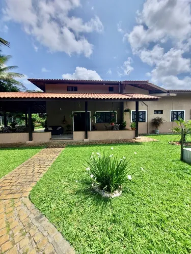 CASA TERREA 4/4, 03 SUÍTES NO PARQUE ENCONTRO DAS ÁGUAS EM LAURO DE FREITAS
