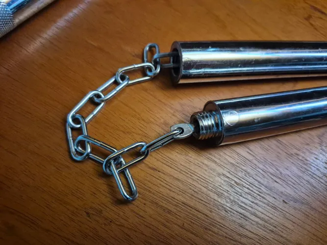 Par de nunchaku/Bastão de aço