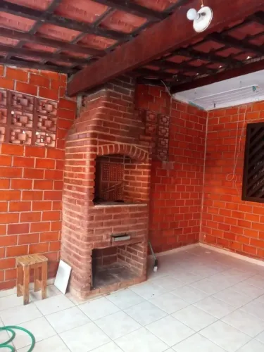Casa com 2 dormitórios para alugar por R$ 2.300,00/mês - Vila Voturuá - São Vicente/SP
