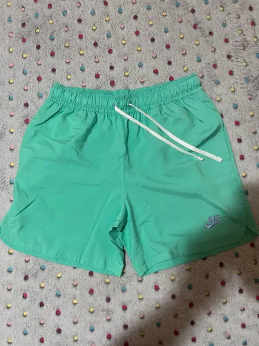 shorts nike club flow verde