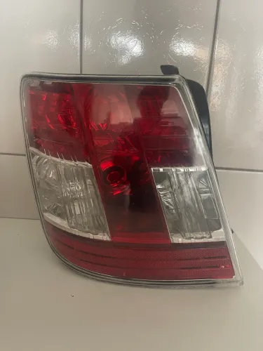 Lanterna traseira e farolete de placa Fiat Stillo (Lado dirieito)