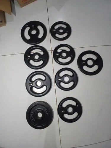 Anilhas de 1 kg e 2 kg.