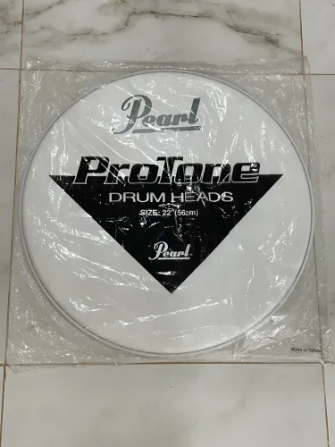 Pele de Bumbo Pearl Protone Coated 22? Resposta c/ Muffle LACRADA NA EMBALAGEM ORIGINAL
