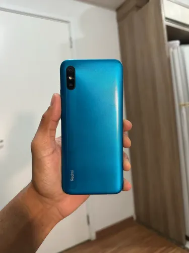 Celular Redmi 9a + carregador novo brinde, celular usado bom