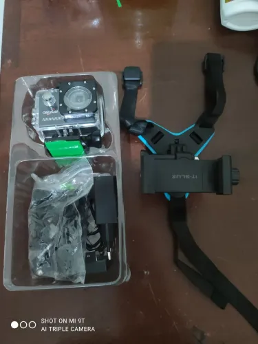 Câmera de ação + suporte de queixeira