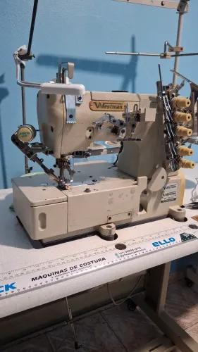 Maquina de costura cobertura eletrônica