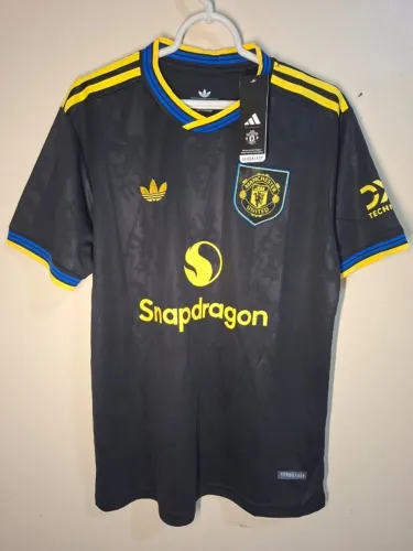 Camisa Manchester United preta 25/26
