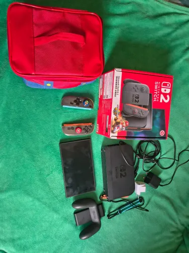 Nintendo Switch 2 + Capa para Joy-Cons + Bolsa de Transporte (Completo / Impecável)