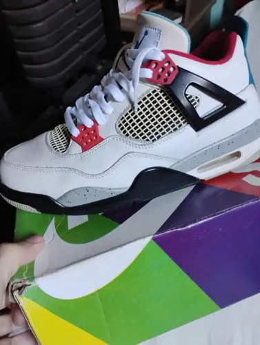 Tênis Nike Air Jordan 4 Retro what the 