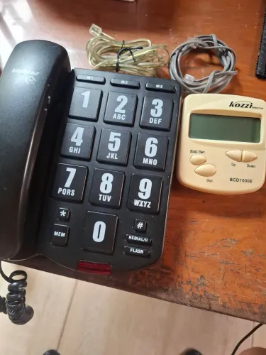 Telefo e com fio fixo e bina