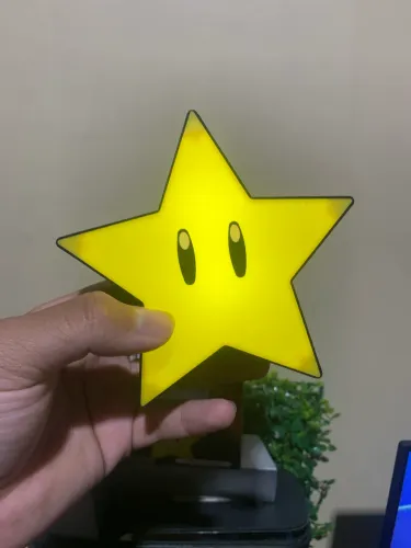 Super star luminária super Mario toca música