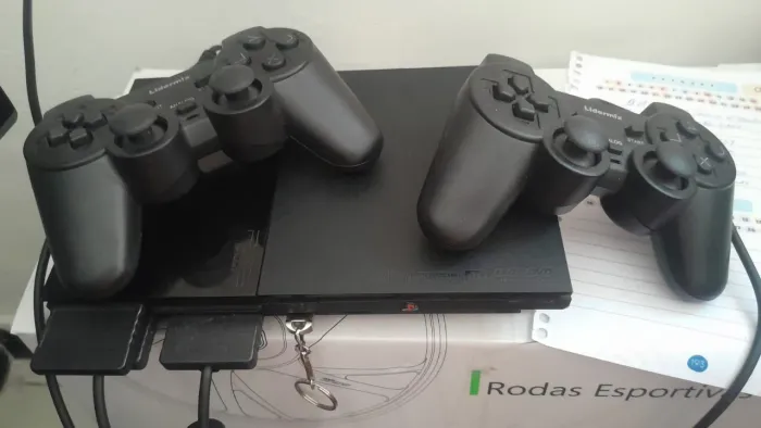 Ps2 (pen driver 32 ,   10 jogos de seu gosto ,  memore card )