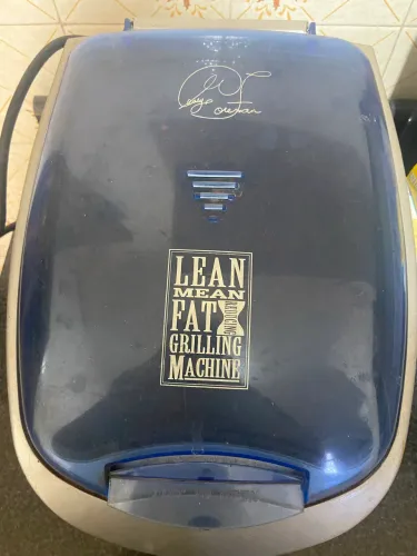 George Foreman Grill lean mean fat grilling machine 