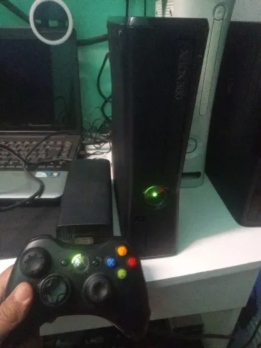 Xbox slim nunca foi aberto tá com lacre