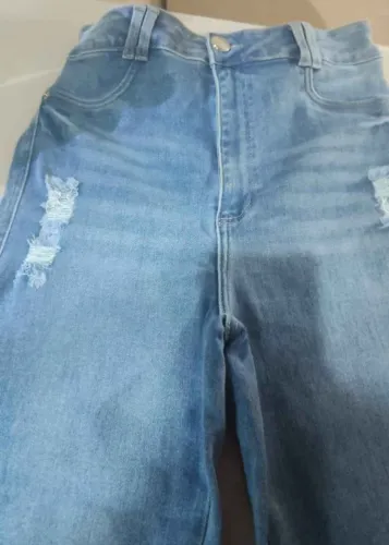 Vendo calça Pit bull.jeans n 46.clara com puídos novíssima.cinto com brilho
