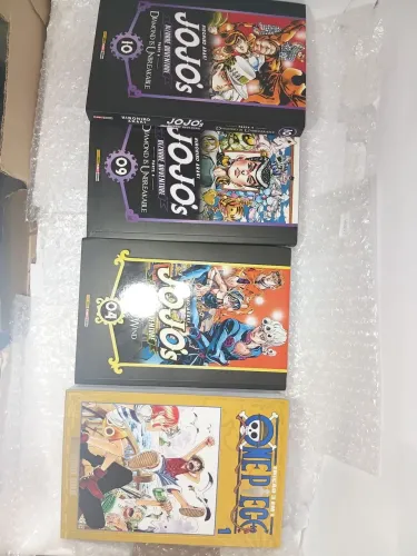 Mangas 50 cada . Jogos parte4 vol 10 e09 jogos parte 5 vol 5. One piece 3 em 1 vol 01