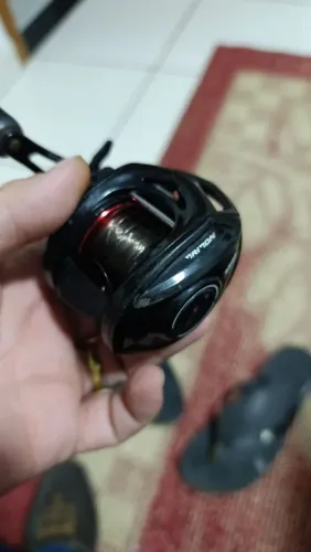Carretilha triton muito boa